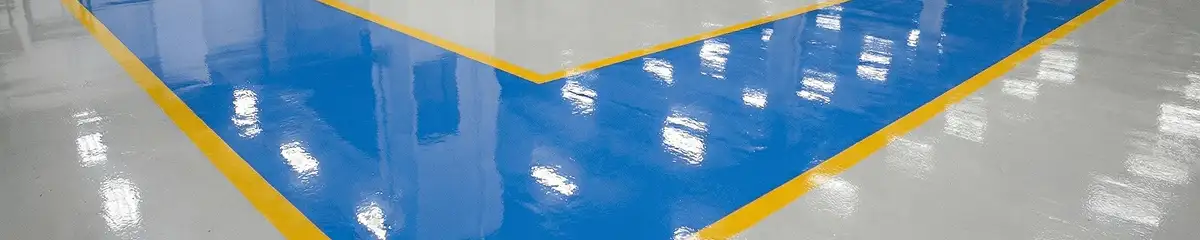 A factory floor professionally covered and marked with epoxy flooring in Toledo, OH