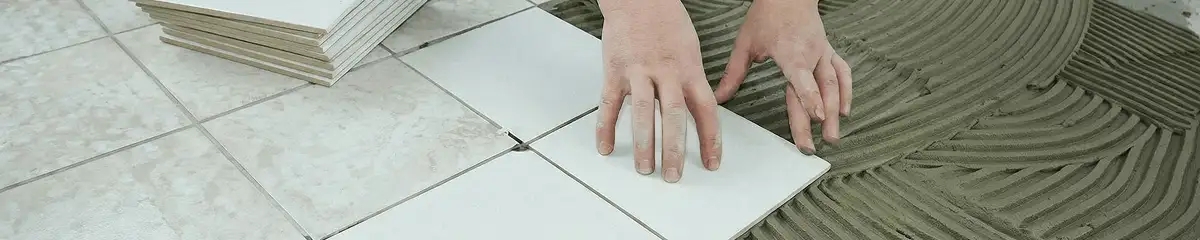 Professional installing white tile floors in Toledo, OH
