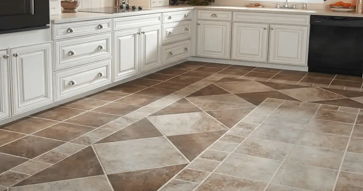 Kitchen with white cabinets and a professionally installed tile floor in Toledo, OH